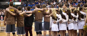 Adams triumphs in crosstown showdown