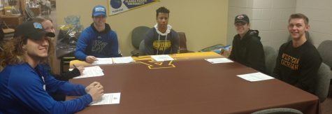Adams Athletes Bring Pride on Signing Day