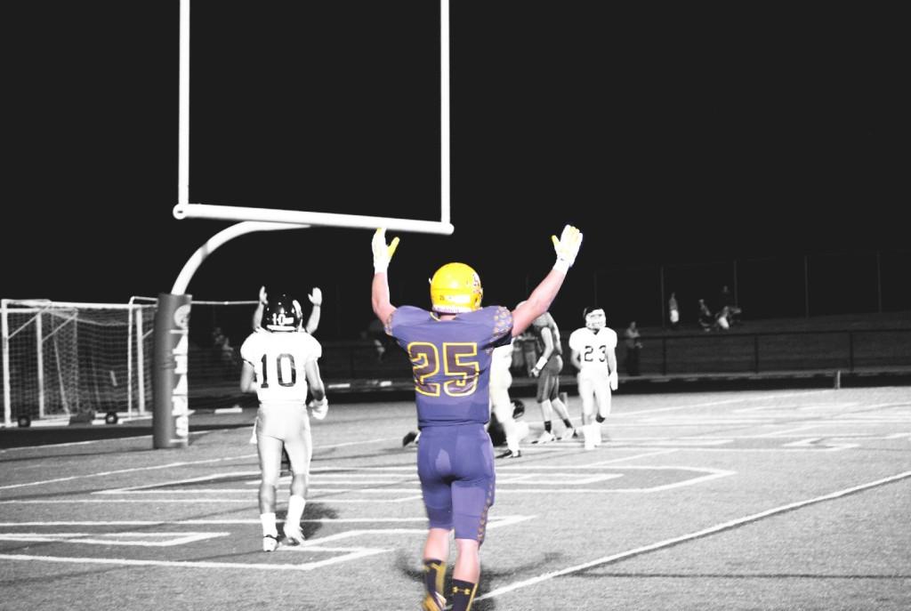 Jordan Shive celebrates after an Adams touchdown at the Homecoming game. 