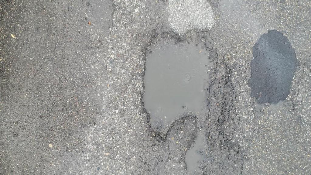 Potholes can be found in many places on Michigan roads. 