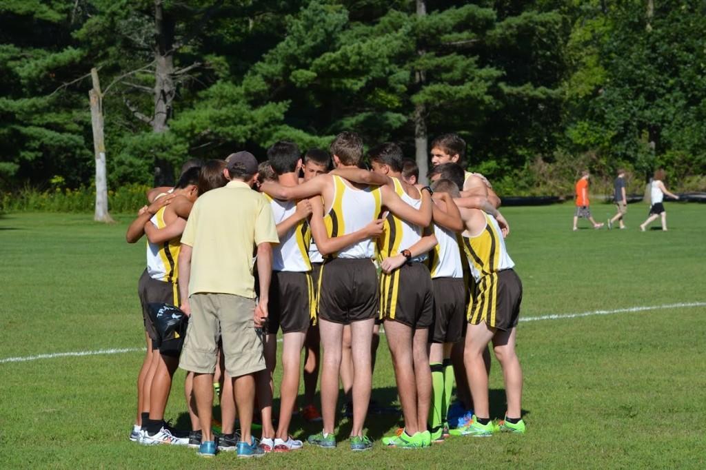 The boys cross country team gathers prior to a meet.