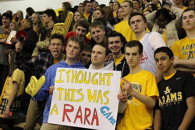 RARA fans hold up a sign promoting RARA during the Crosstown Showdown.