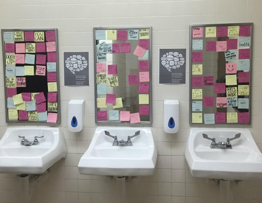 Positive+sticky+notes+cover+the+mirrors+in+the+girls+bathroom%2C+encouraging+girls+to+love+themselves+and+one+another%21