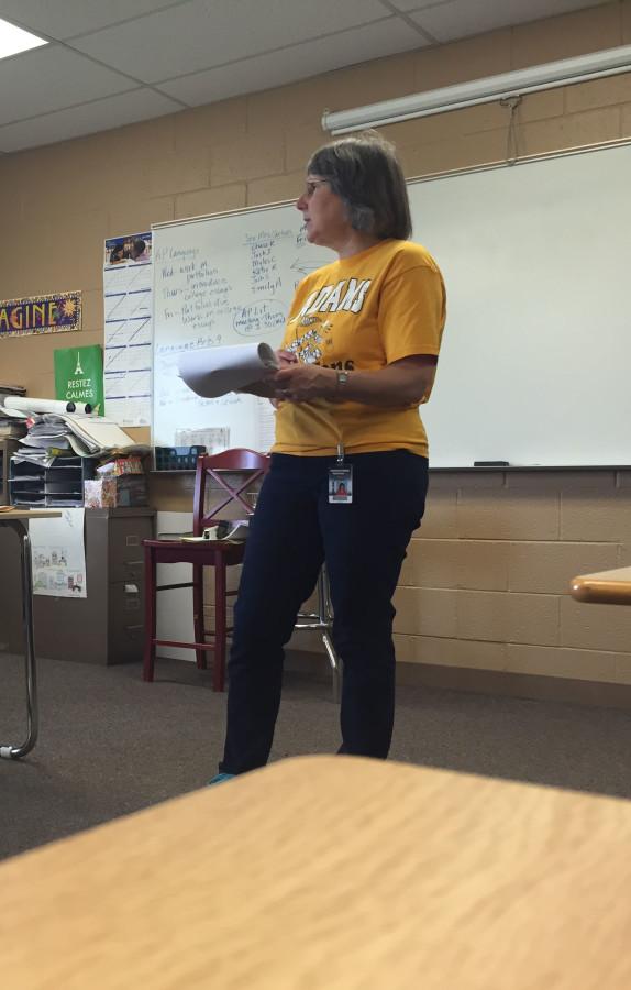 Mrs. Albertus instructing her AP English Language class on their college essay assignment.