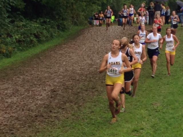 Adams girls lead the pack at the Holly Invitational.