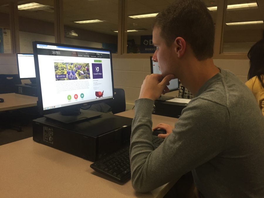 Adam Garfinkle signs onto Common App in preparation for applying to colleges.