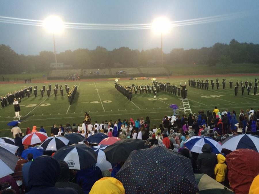 Highlander+Marching+Band+performs+a+halftime+performance%2C+spelling+out+AHS.