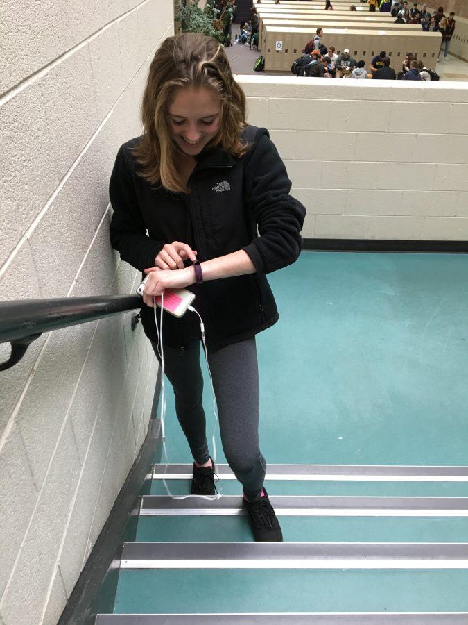 Sophomore Delaney Rutherford notices progress in her goal of being more active throughout the day by tracking her steps on her fitbit and taking the stairs. 
