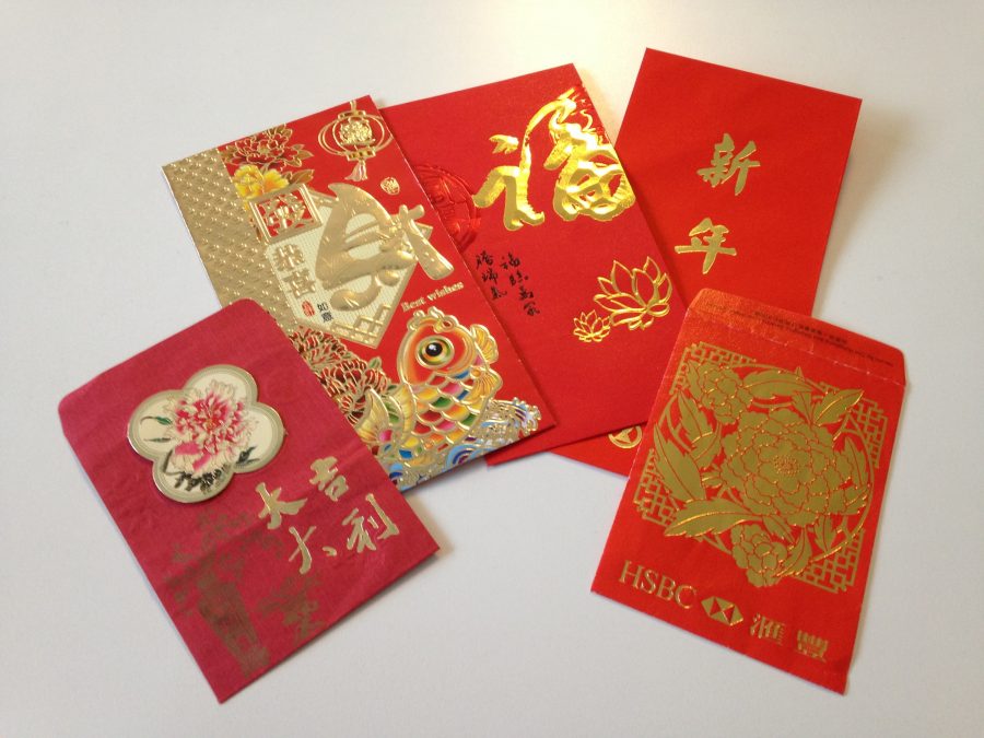 Children traditionally receive red envelopes on New Years, containing various amounts of money.
