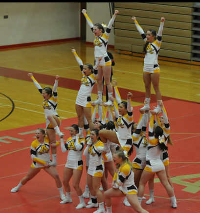 The Adams Cheer performing a round in the Regional Competition.