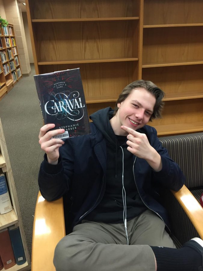 Will Arkwright at book club reading one of his favorite books.