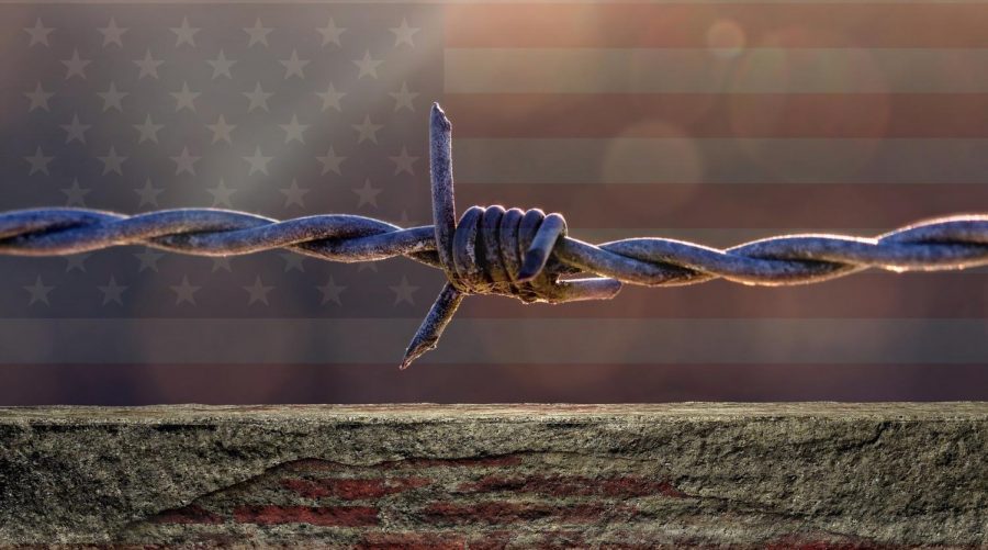 Metal wiring of a border fence tied up in a knot-symbolic of the intense debate in America.