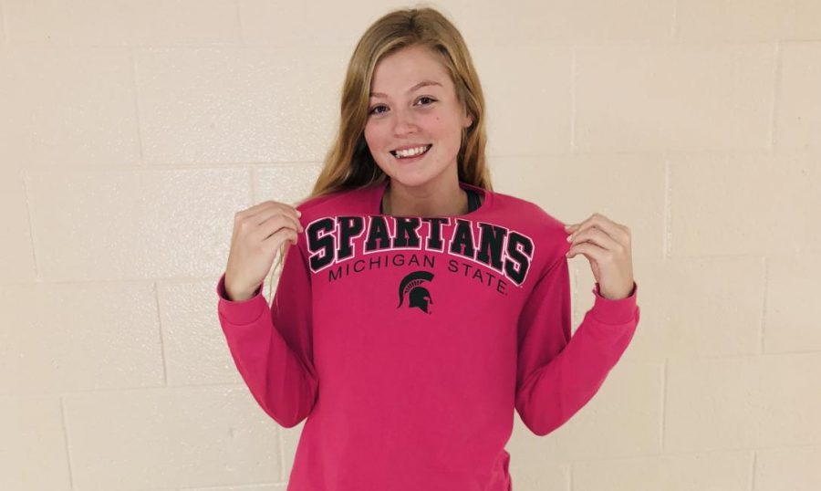 Senior Bailey Pease representing her future college Michigan State University.