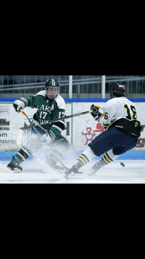 Caden Ebinger stopping the puck from getting in Rochester Uniteds zone. 
