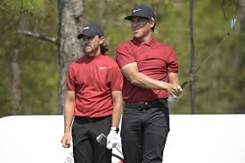 Golfers show respect on Sunday wearing Tiger’s famous red