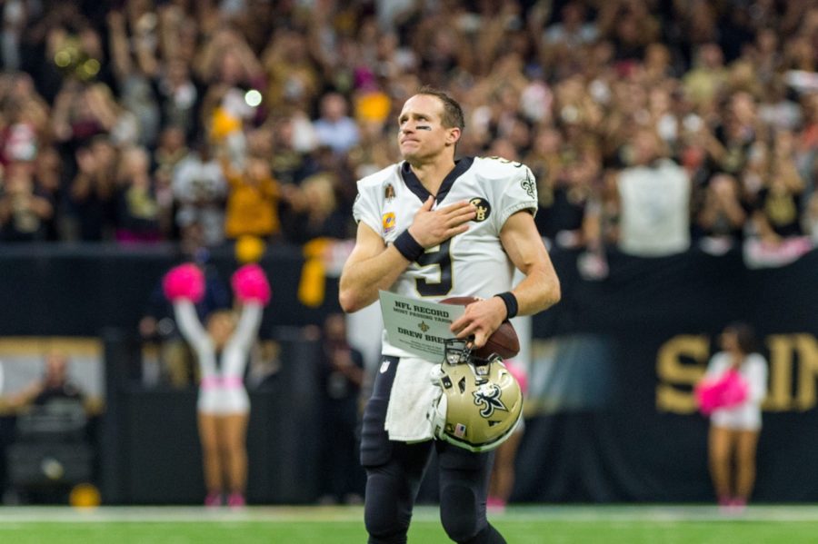 Drew Brees thanks the fans after breaking the NFL record for passing yards on Oct. 8, 2018. 


