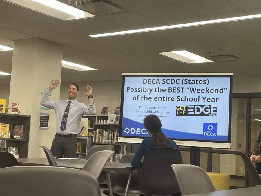 DECA advisor Vince LoPiccolo shares SCDC information to students at a chapter meeting on Wednesday, March 1, 2023 (Photo Credit: Noah Stockoski)