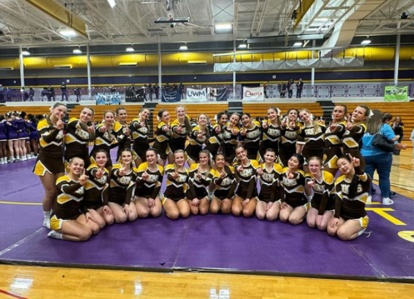 The 2023 Adams Varsity Cheer Team after winning their first league competition this season. (Photo Credit Adams Cheerleading)