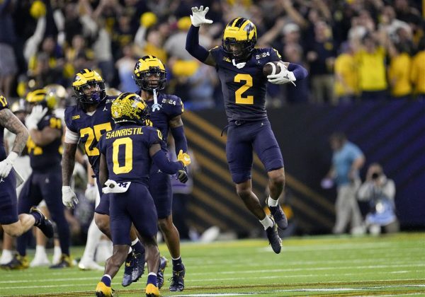 Will Johnson (2) celebrates an interception in the National Championship game against Washington (Photo Credit: AP)