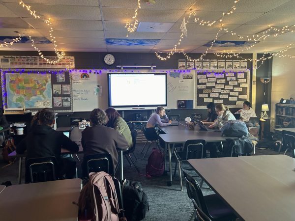 AP Research class peer editing each others academic papers. (Photo Credit: Ella Zazeckis)